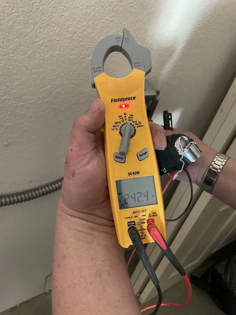 Voltage testing with clamp meter during Electrical Installation Services in Jurupa Valley